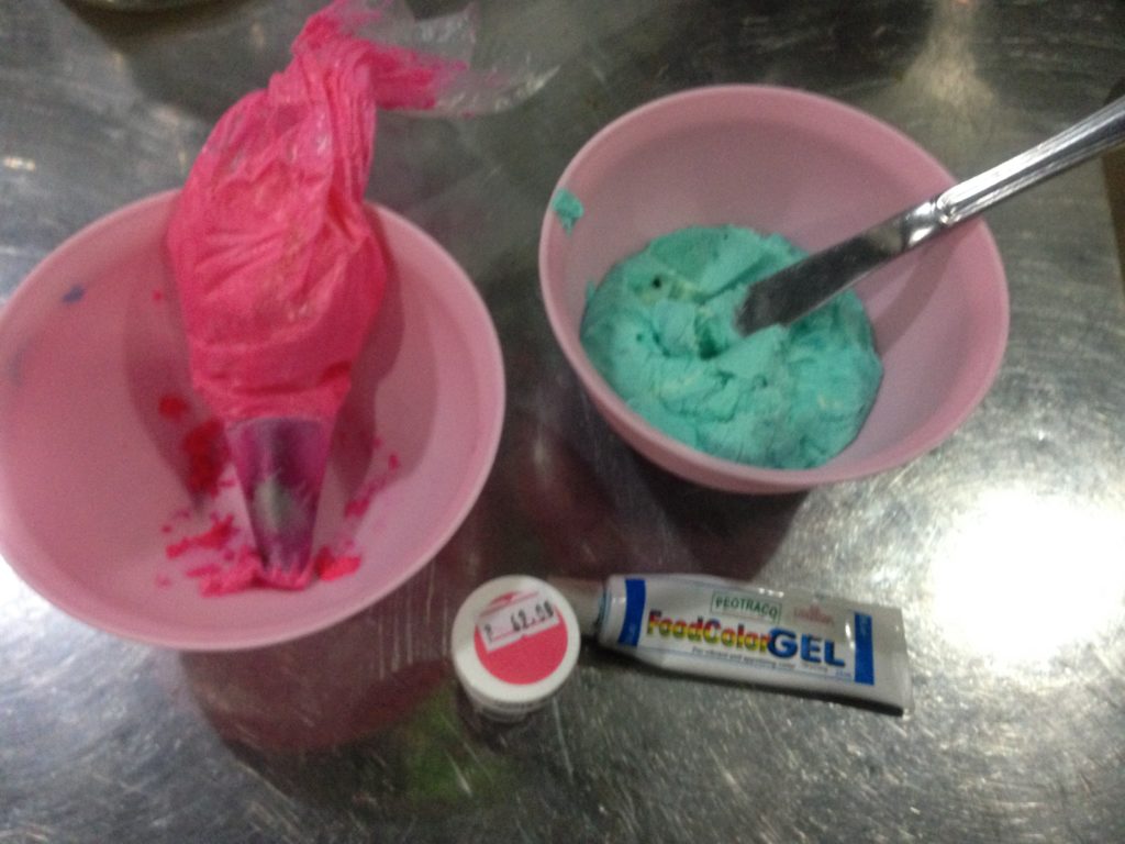 butter cream frosting with pink and blue coloring