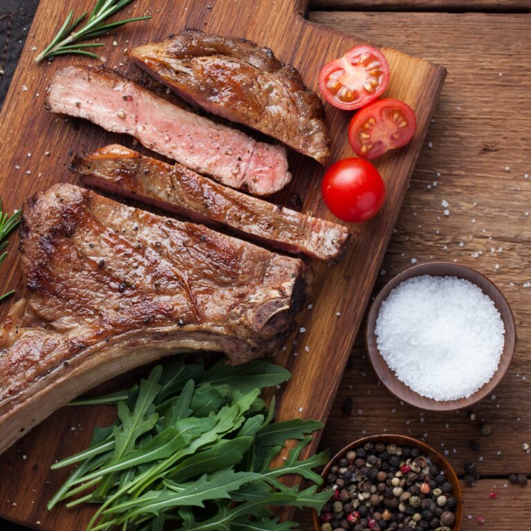Raw cowboy steak on the bone. Or possibly ribeye.
