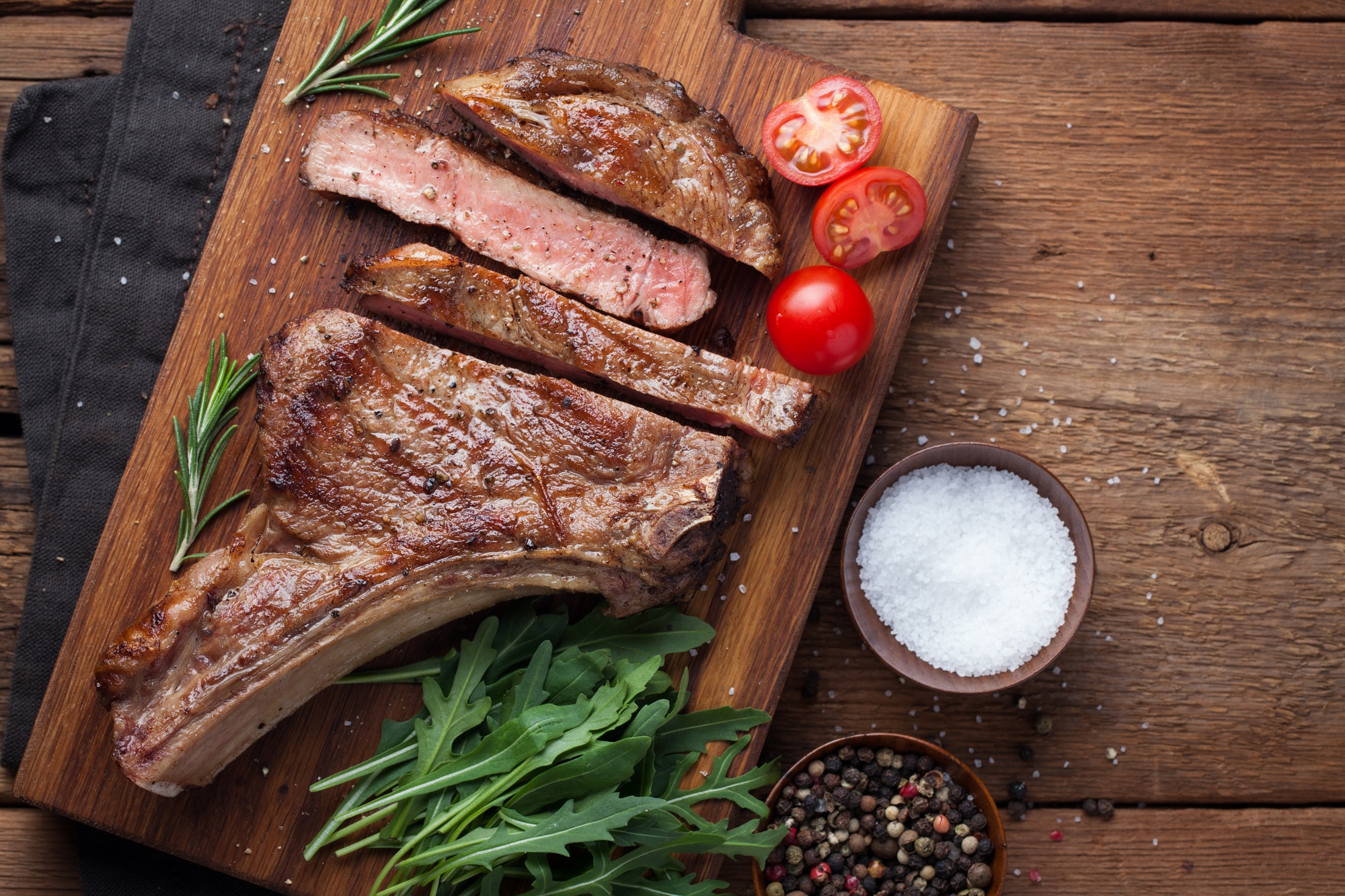 Raw cowboy steak on the bone. Or possibly ribeye.