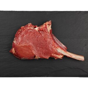 Close up raw beef tomahawk ribeye steak
